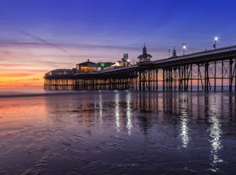 The North Pier at sunset with the tide in.