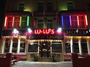 Front of Lulu's bar at night